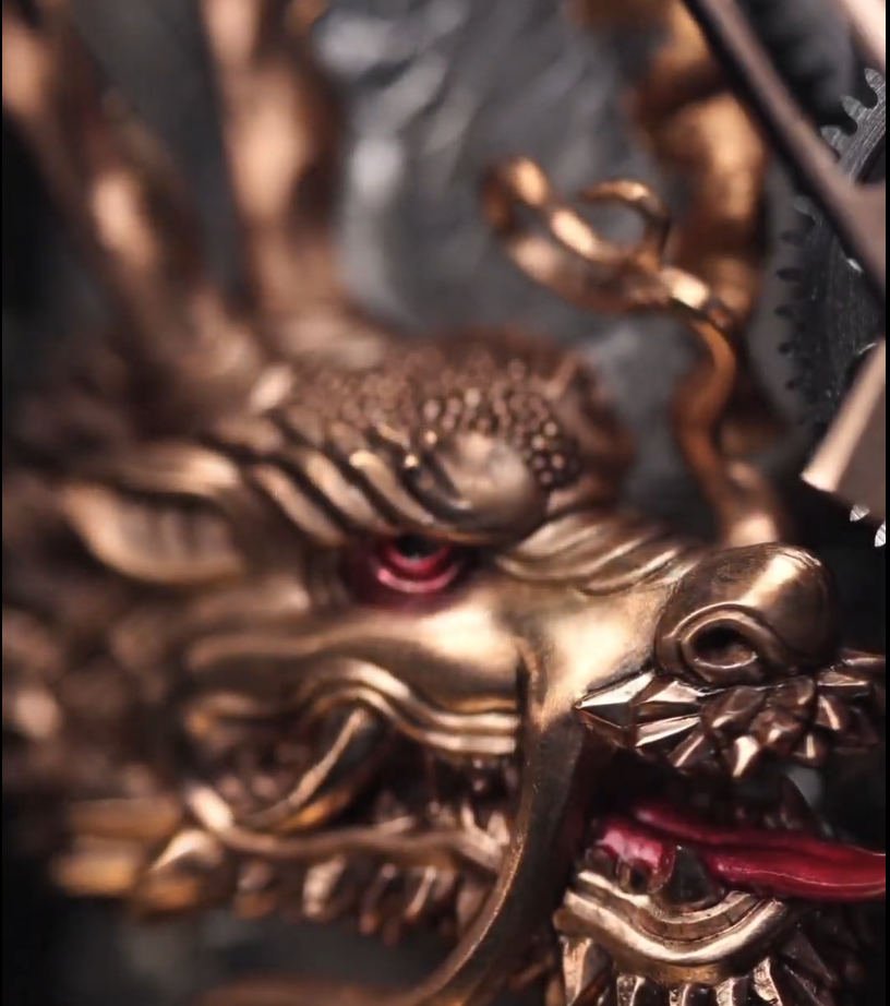 Macro close-up of dragon detail inside Richard Mille watch.