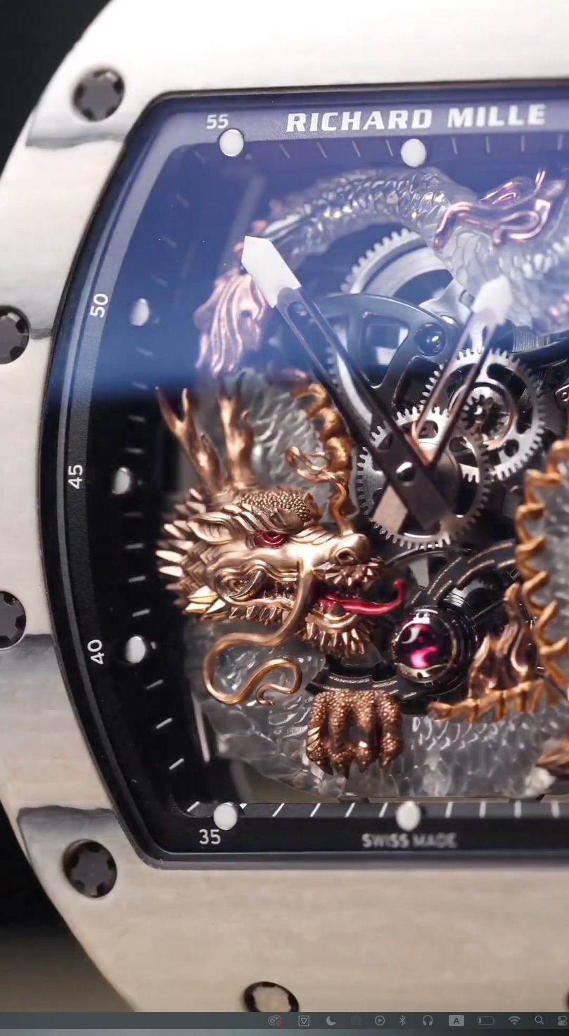Macro detail of Richard Mille RM 057 Tourbillon Dragon watch face.