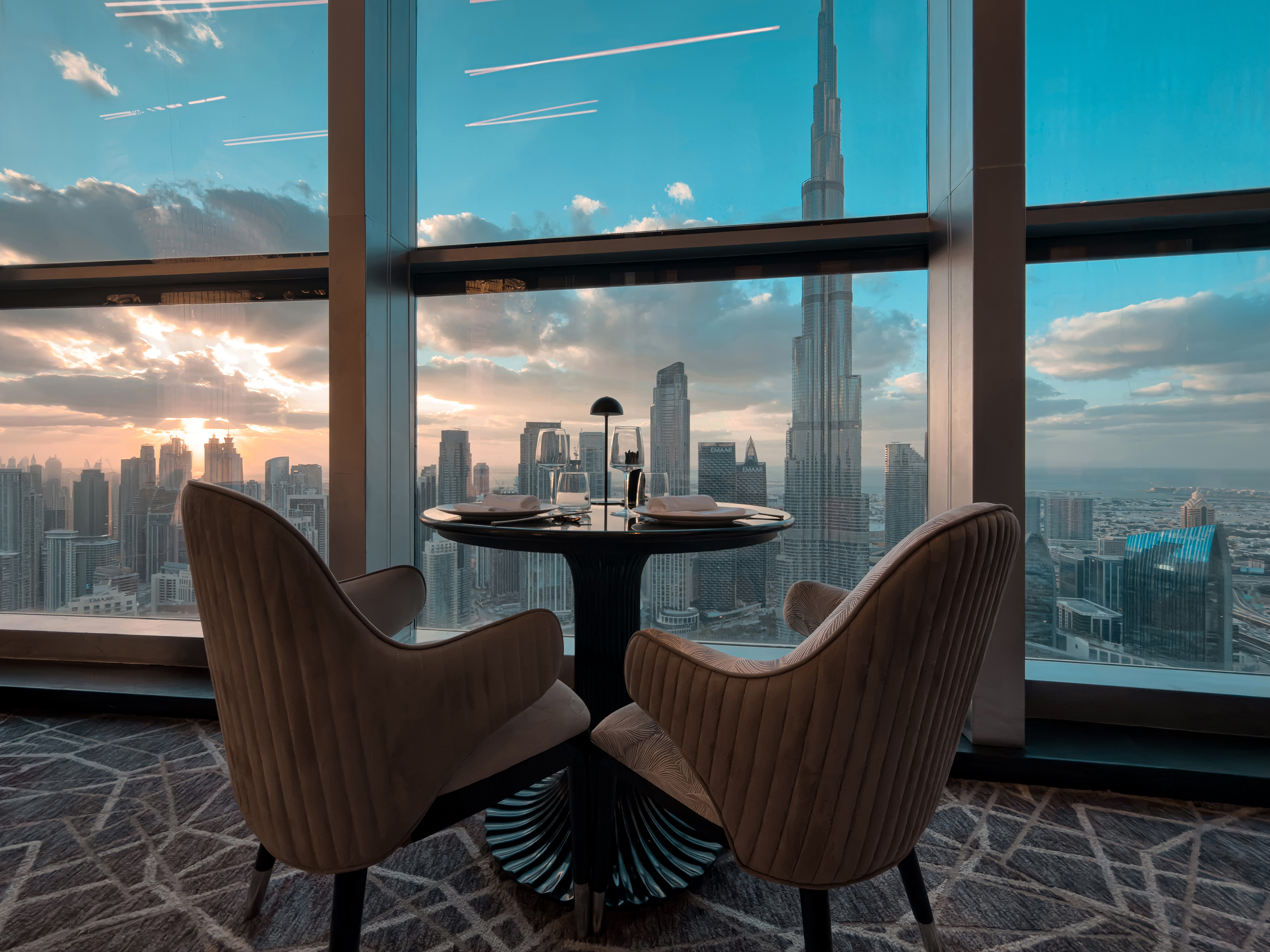 Private table at BIRDS Dubai overlooking the Burj Khalifa skyline.