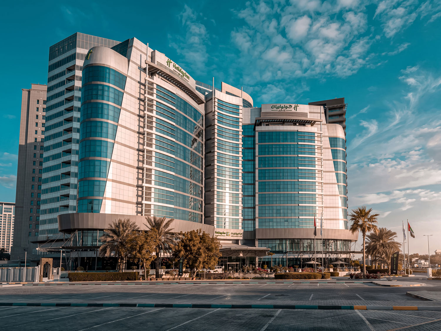 Angled exterior view of Holiday Inn Abu Dhabi.