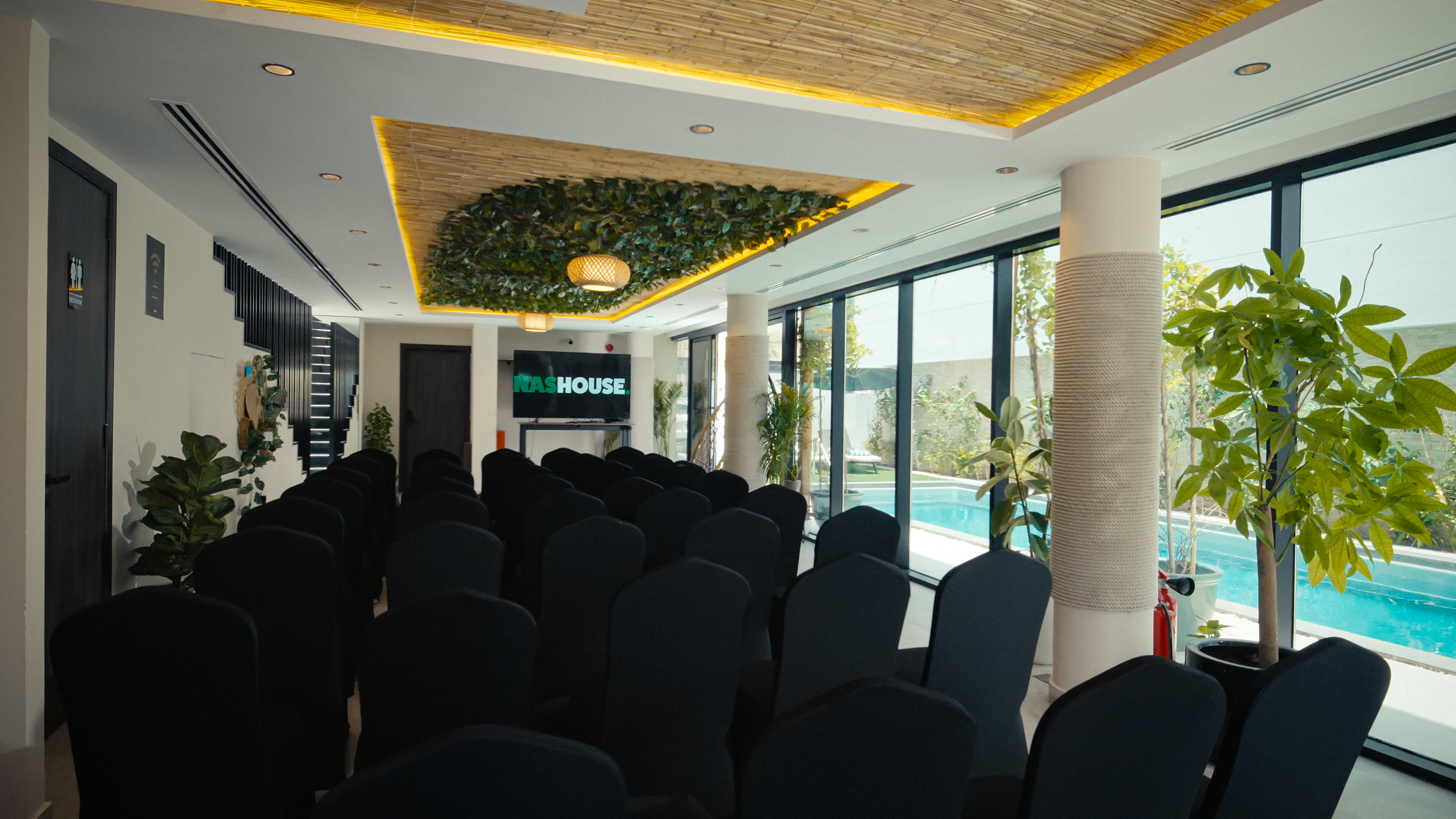 Conference seating at NAS House arranged for a presentation.