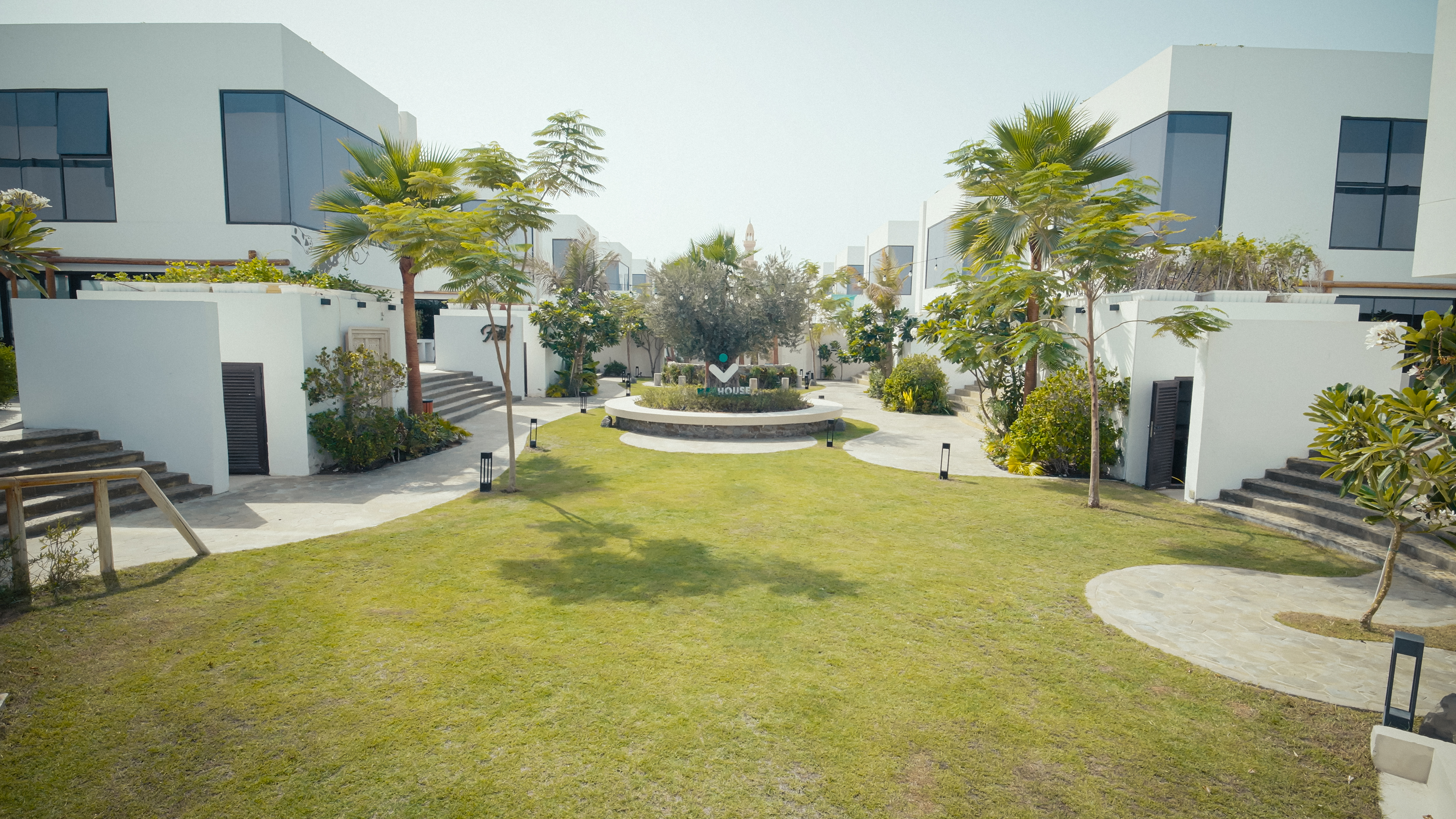 Wide view of NAS House landscaped courtyard and surrounding residences.