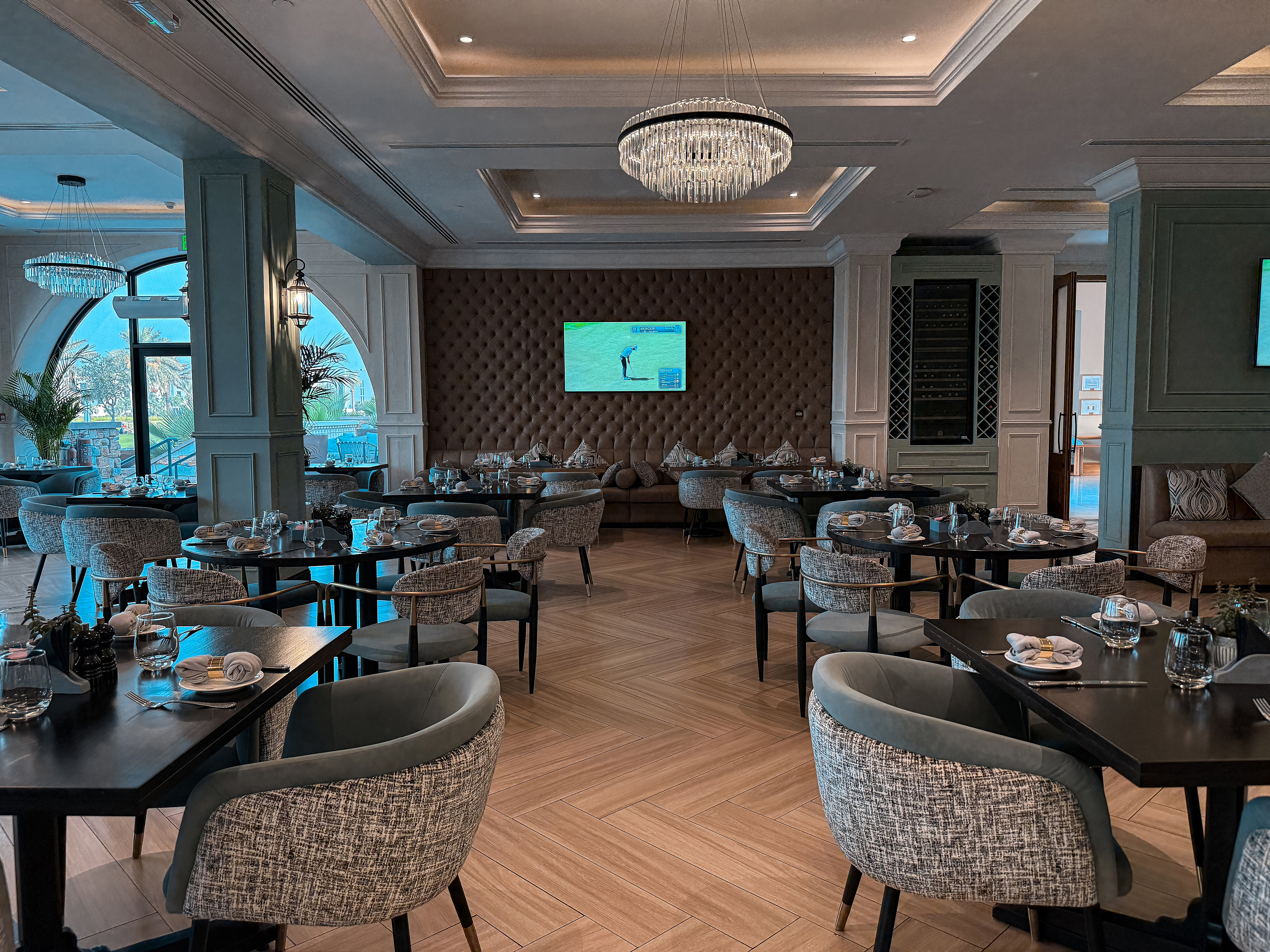 Elegant restaurant interior at Saadiyat Beach Golf Club.