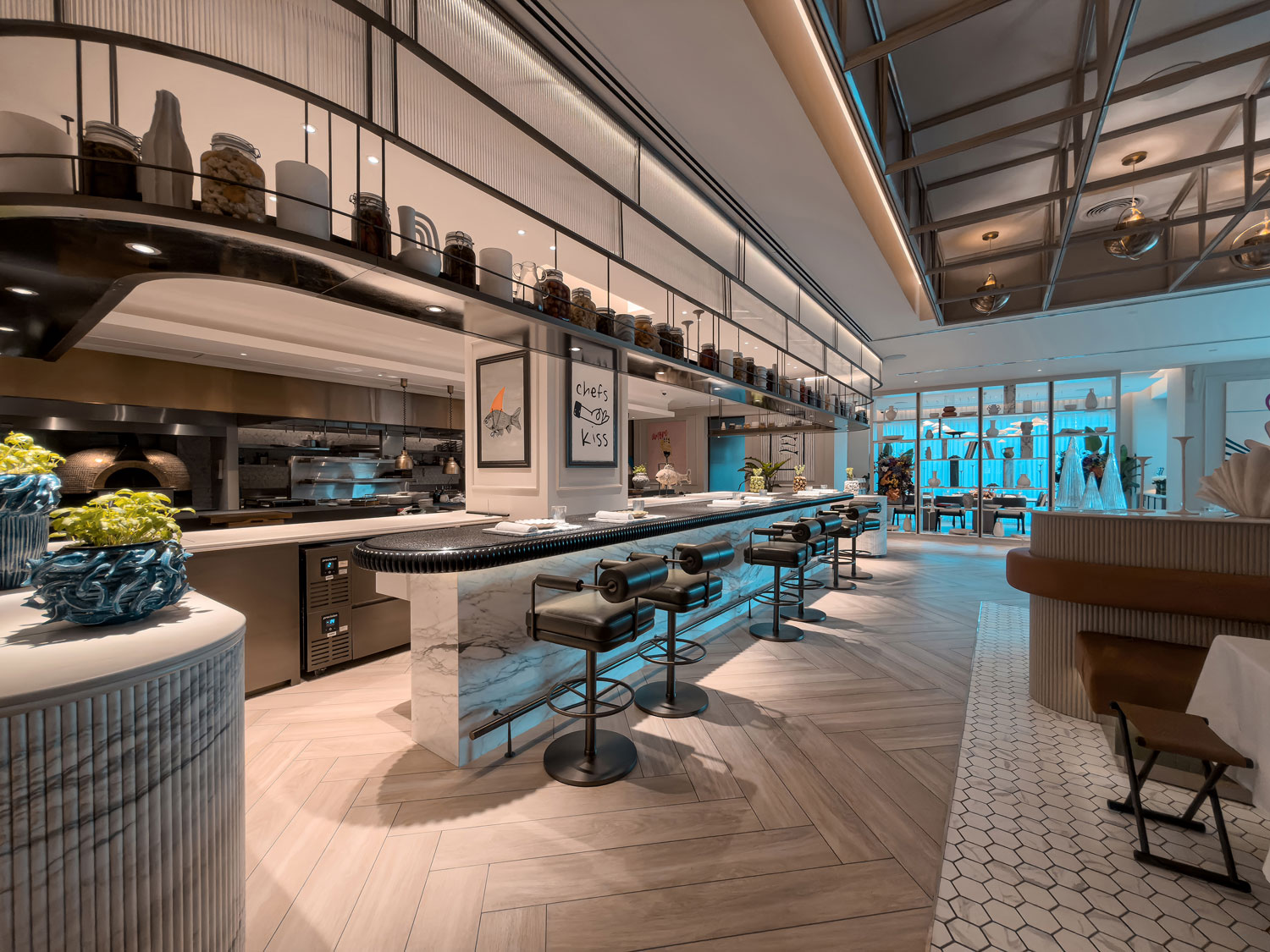 Chef's counter and open kitchen area inside Vera Versilia.